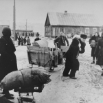 Residents of the ghetto move to new housing after the Germans reduced the borders of the Kovno ghetto. Provenance: George Kadish/Zvi Kadushin @USHMM